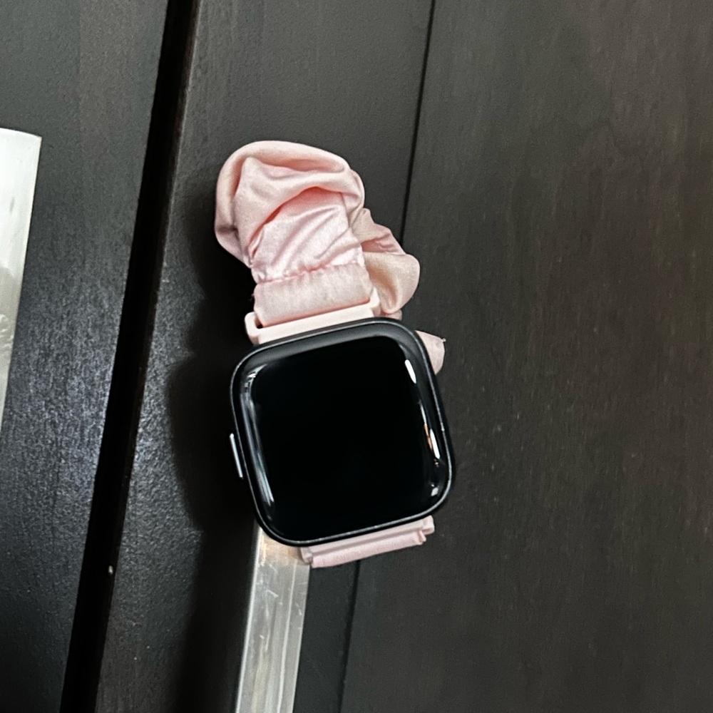 Fitbit Versa 2 with charger and 9 bands